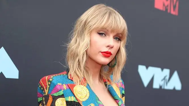 Taylor Swift joins The Voice as a mentor.